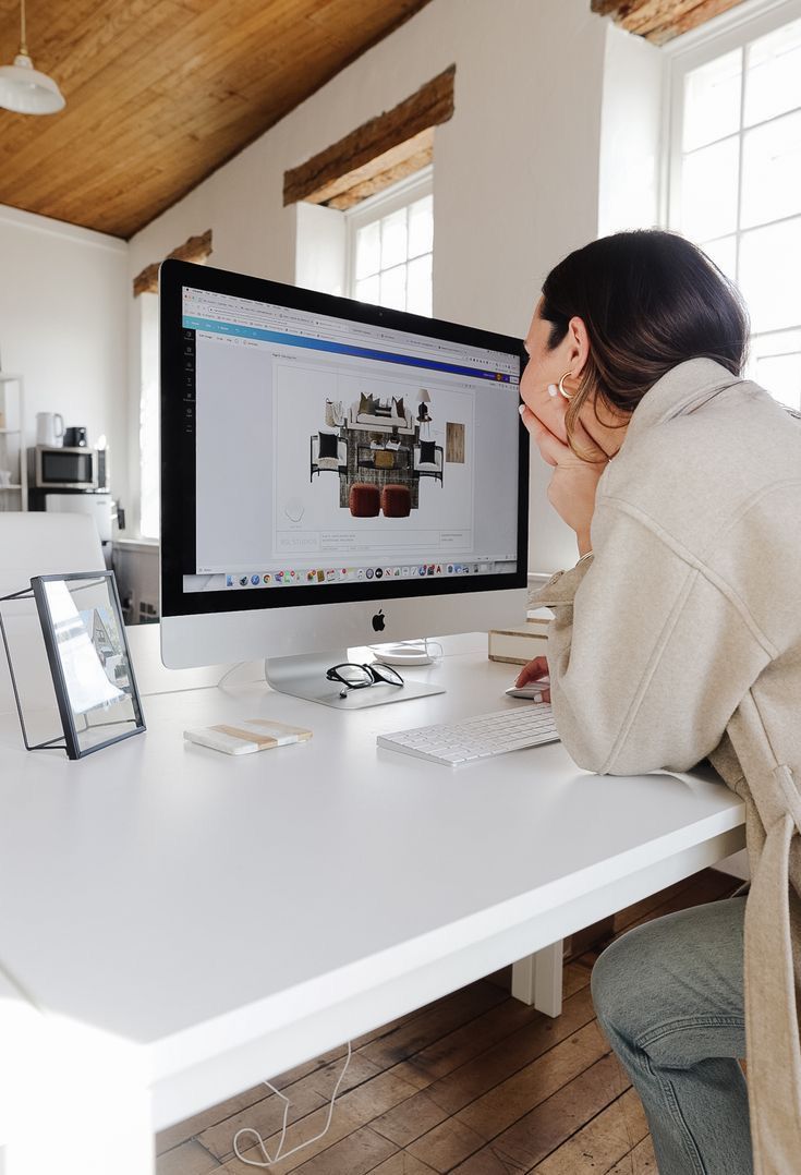 iMac in the studio showing a web design